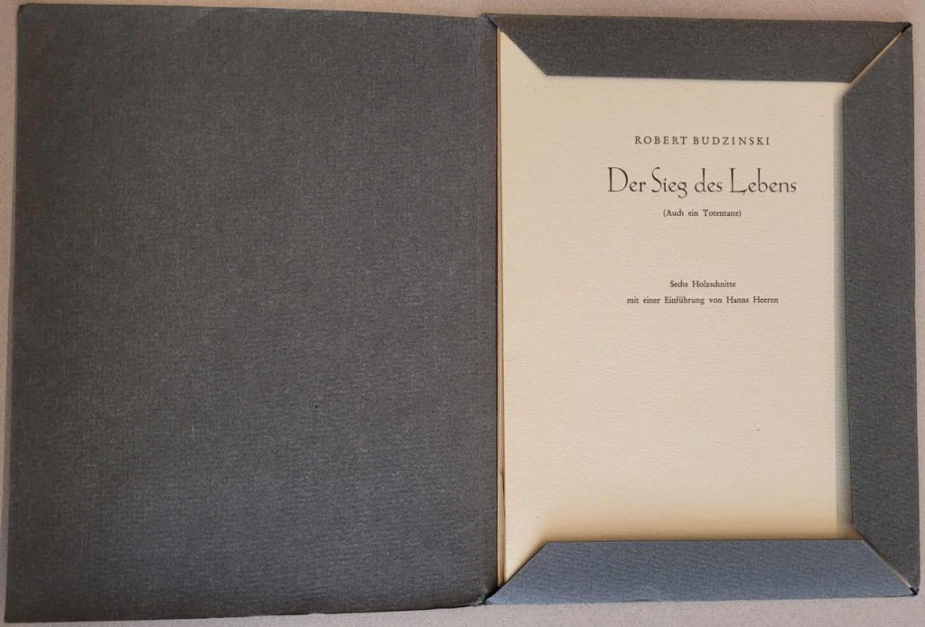 Open folder of Budzinski's 1948 wordless story, Sieg des Lebens showing the title page.