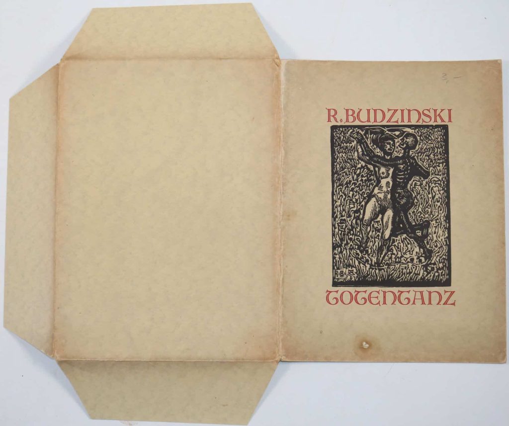 Front cover of the folder for Budzinski's 1924 wordless story, Totentanz, showing the Maiden dancing with Death surrounded by miniature figures.