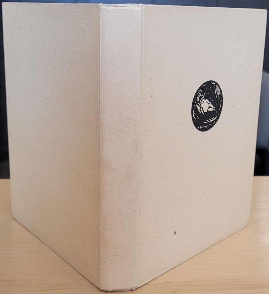 Front cover, spine, and back cover of
Bochorakova's wordless novel, Z Mého Dětství.