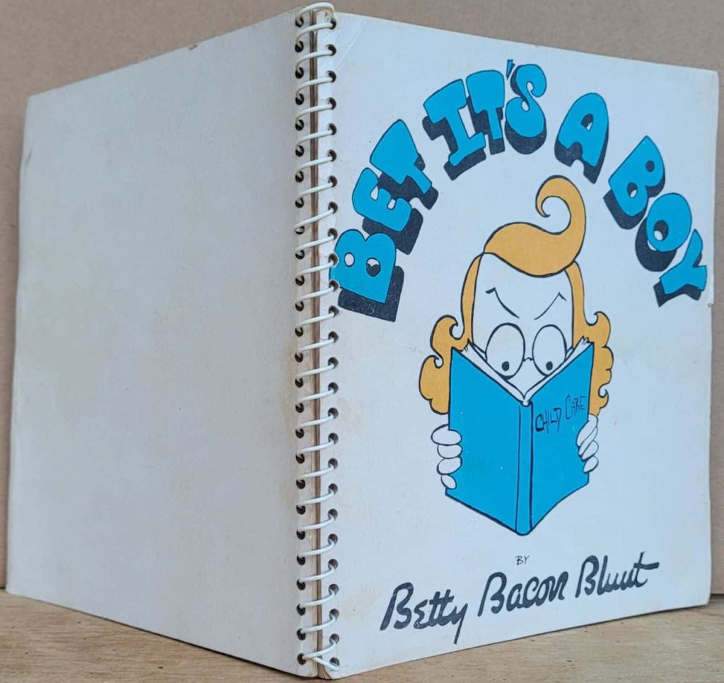 Betty Bacon Blunt's wordless novel, Bet It's a Boy - plastic wire spiral binding showing front and back covers.