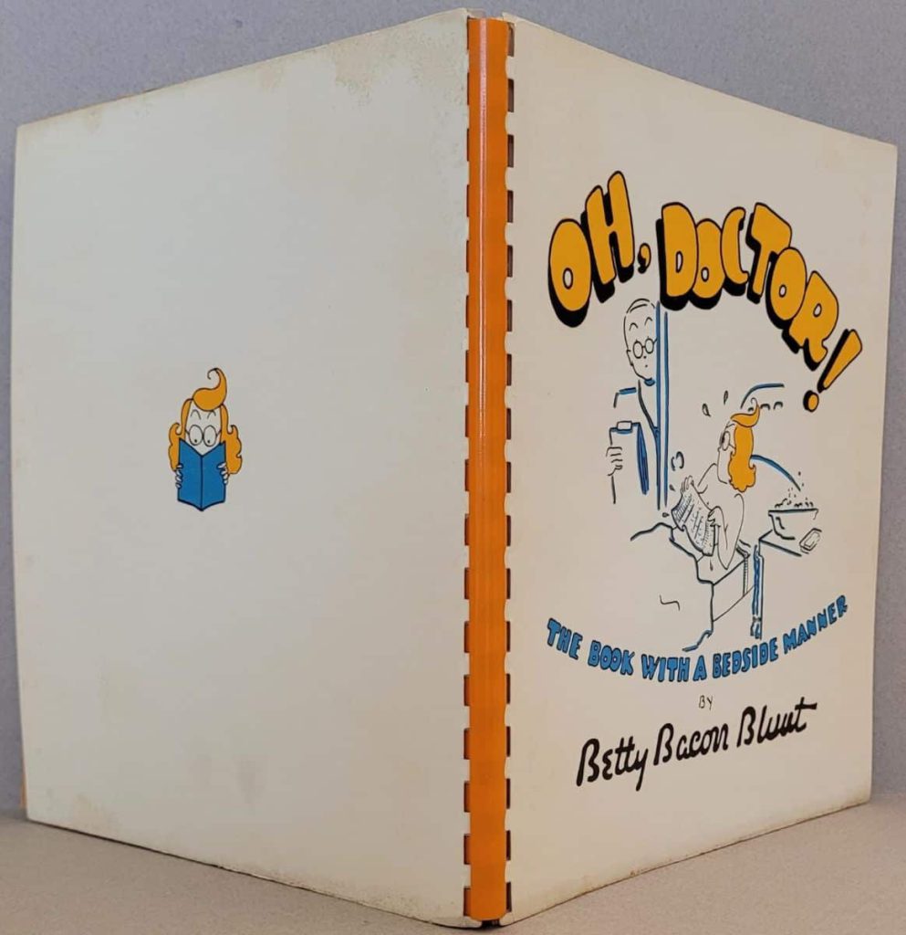 Betty Bacon Blunt's 1941 wordless novel, Oh Doctor! with a plastic comb binding and its covers.