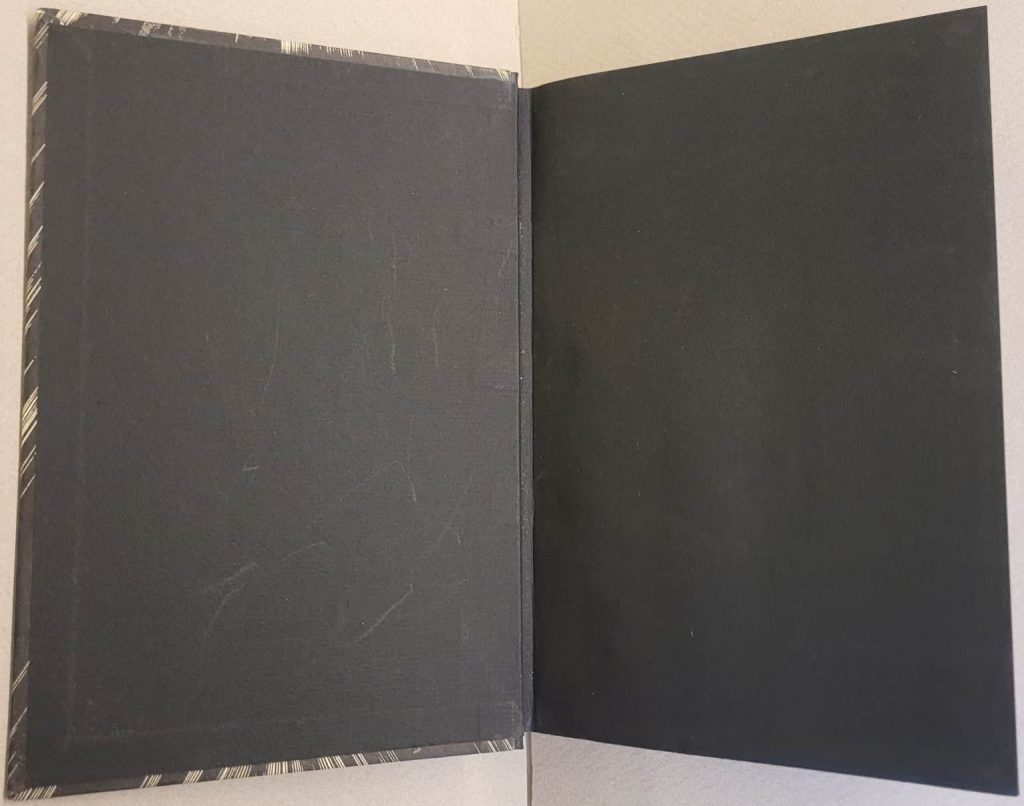 1st printing of the UK edition in 1930 of Lynd Ward's wordless novel, Gods' Man. Shows the front pastedown and front free endpaper of the book.